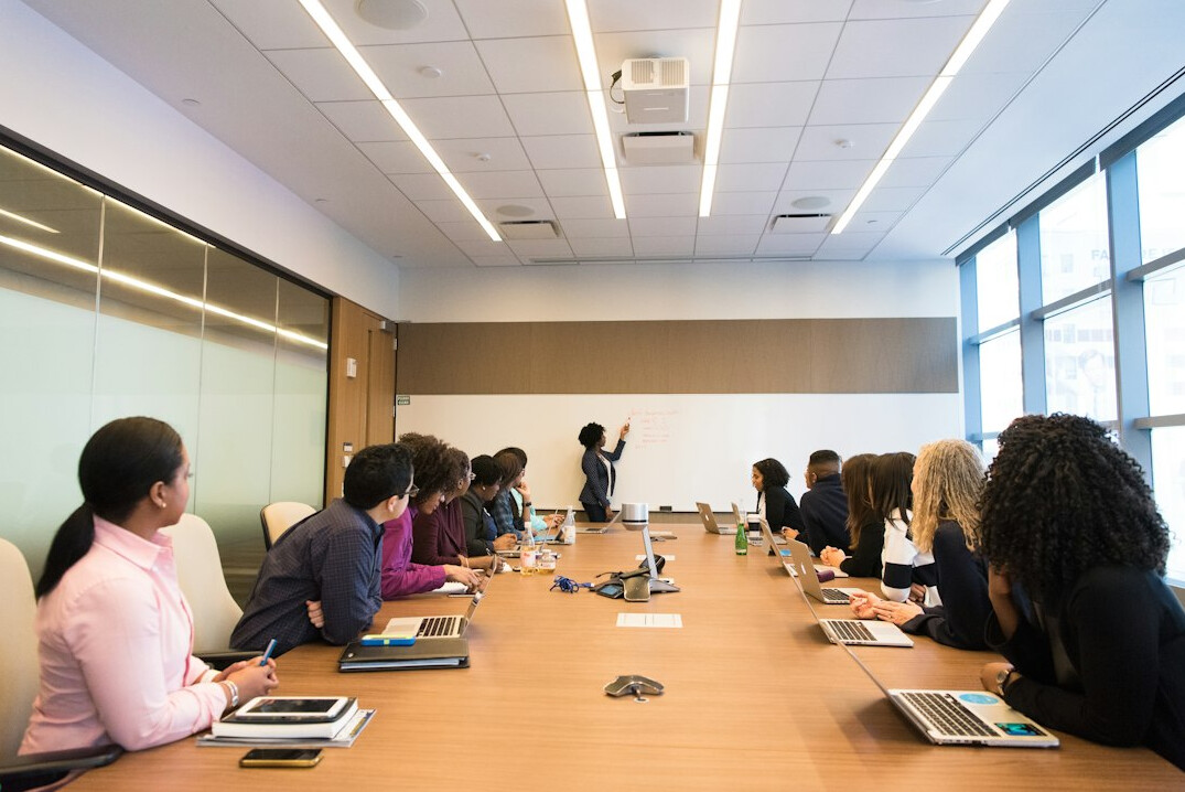 corporate executives in meeting
